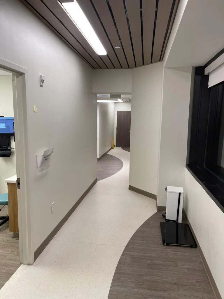 Medical facility hallway interior painting by National Painting Partners