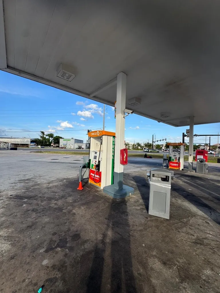 Commercial convenience store painting in Orlando, FL by National Painting Partners - view 11