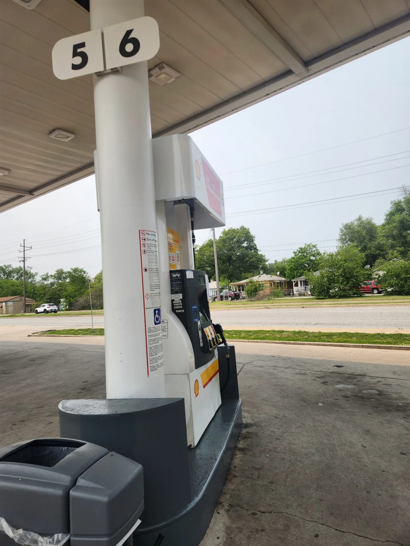 Gas station pump island base painting in Hobart, IN by National Painting Partners