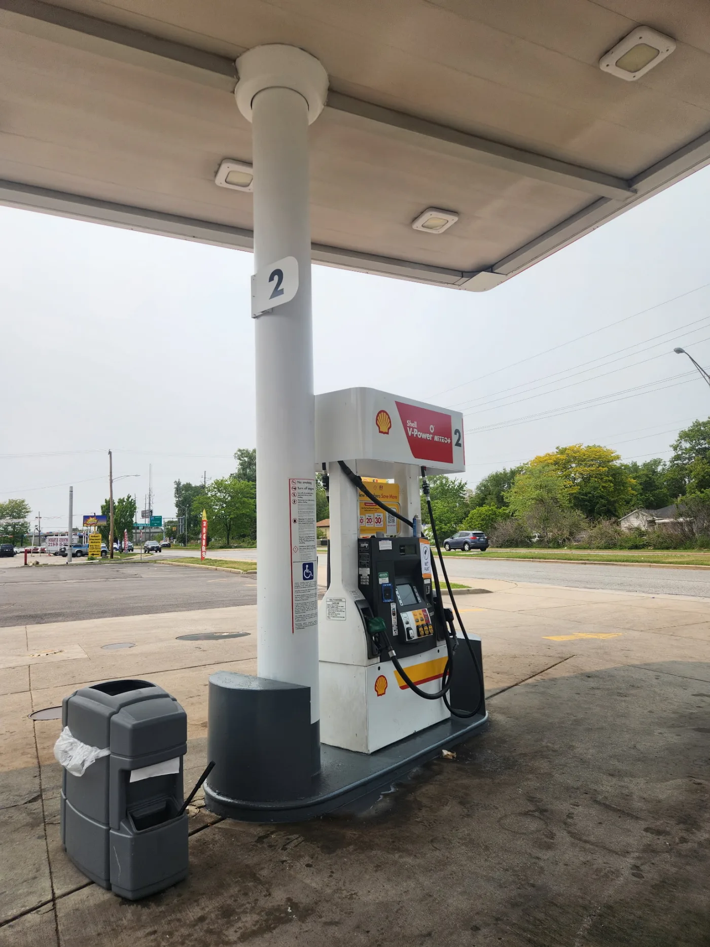 Gas station fuel pump island close-up in Hobart, IN by National Painting Partners