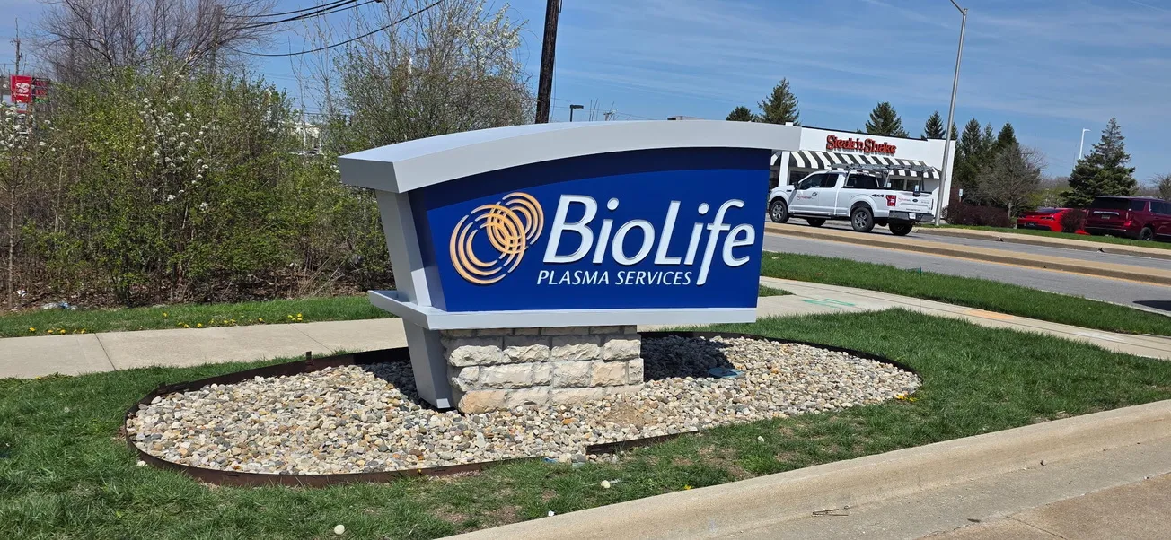 Medical facility monument sign side profile during commercial repainting in Fort Wayne, IN by National Painting Partners