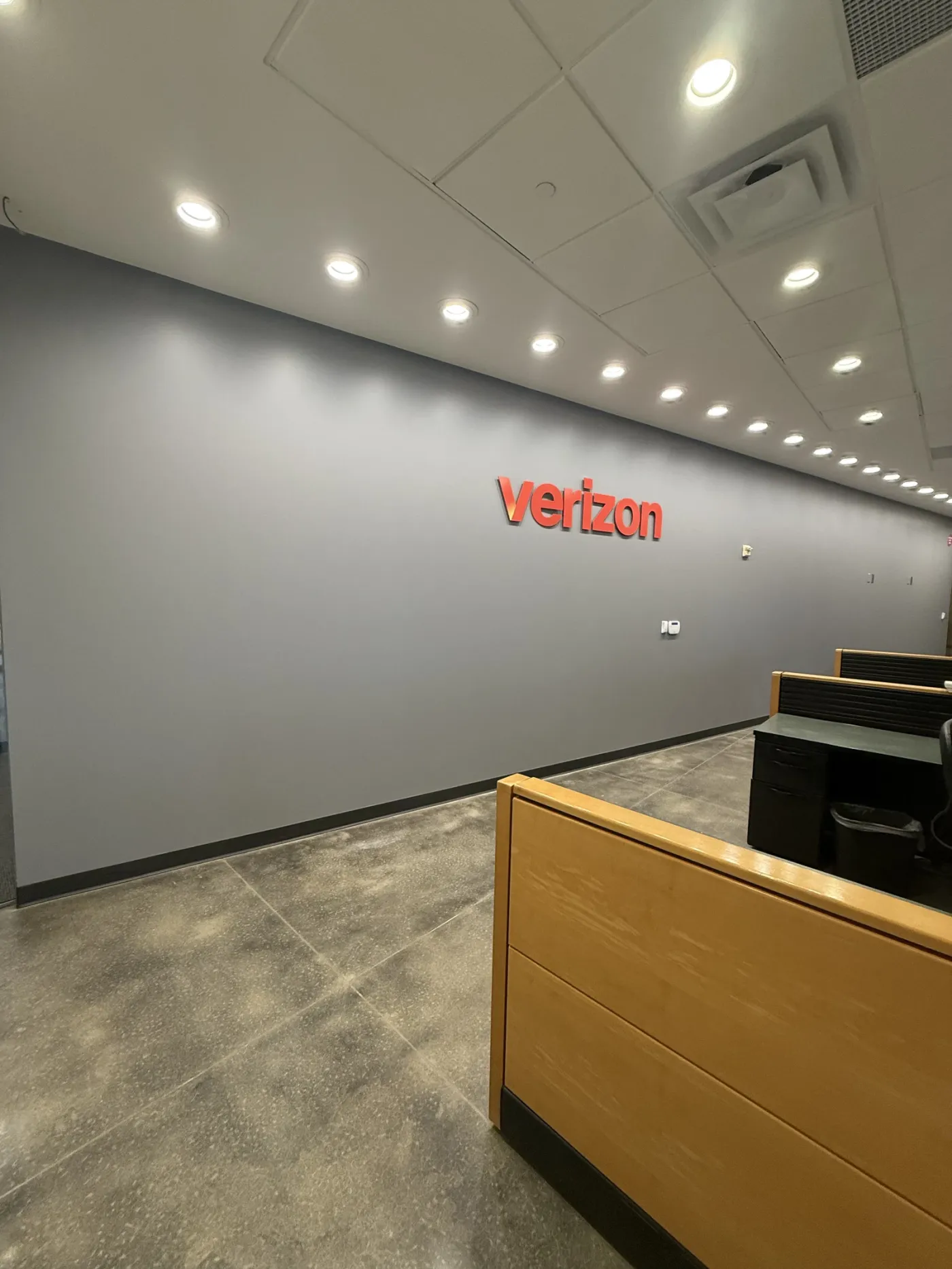 Wireless retail store interior painting in Weldon Springs, MO by National Painting Partners - view 1