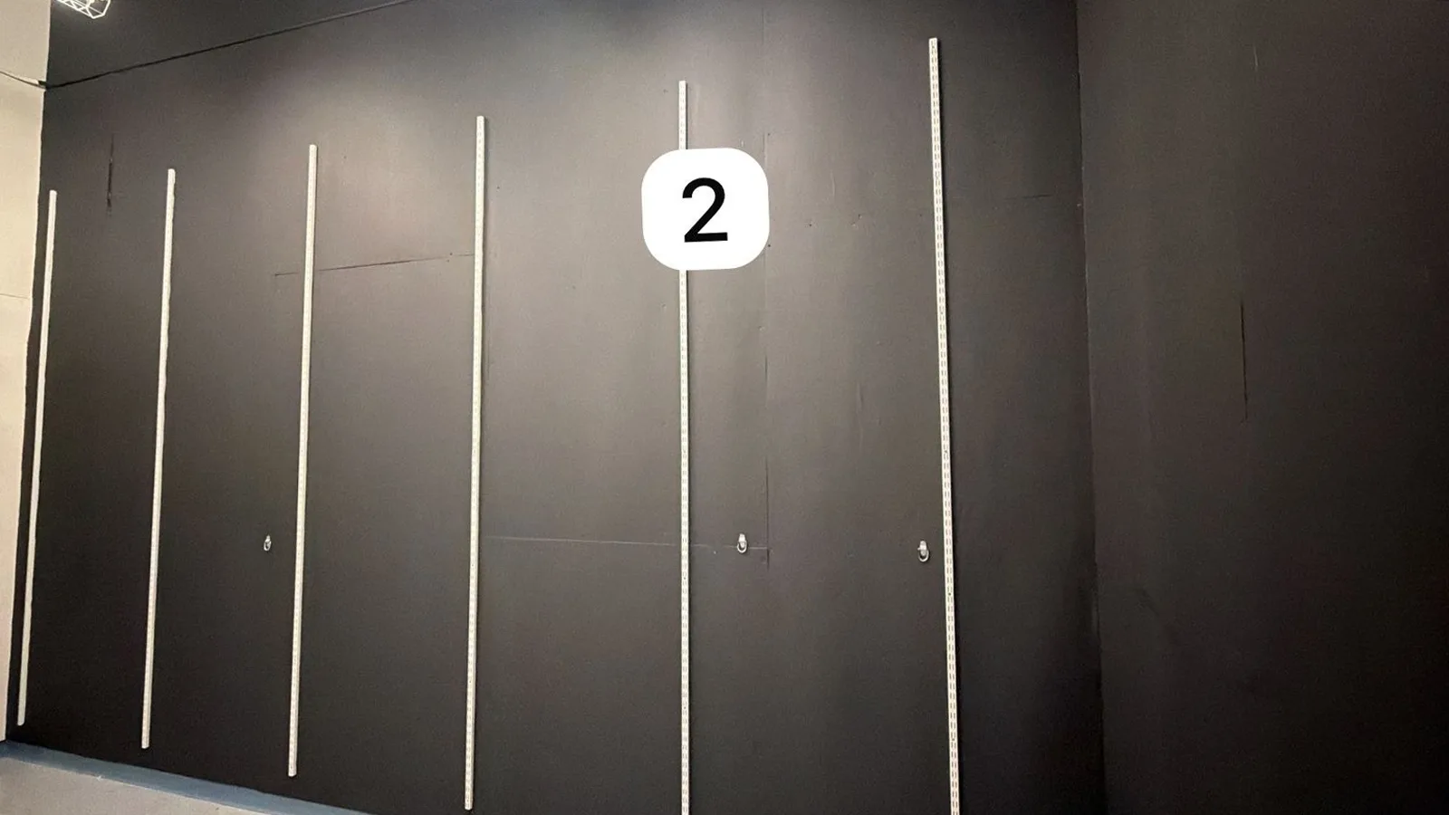 Stockroom wall 2 with wall standards finished in shielding paint