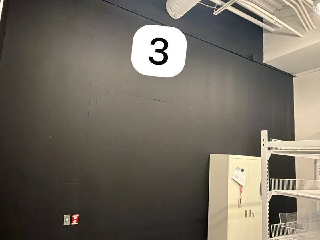 Full stockroom wall 3 after RFID shielding paint, ceiling line to floor