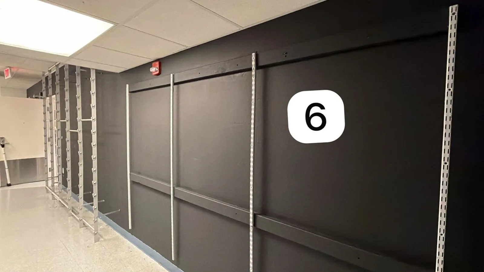 Long stockroom wall 6 finished in RFID shielding paint with zone number