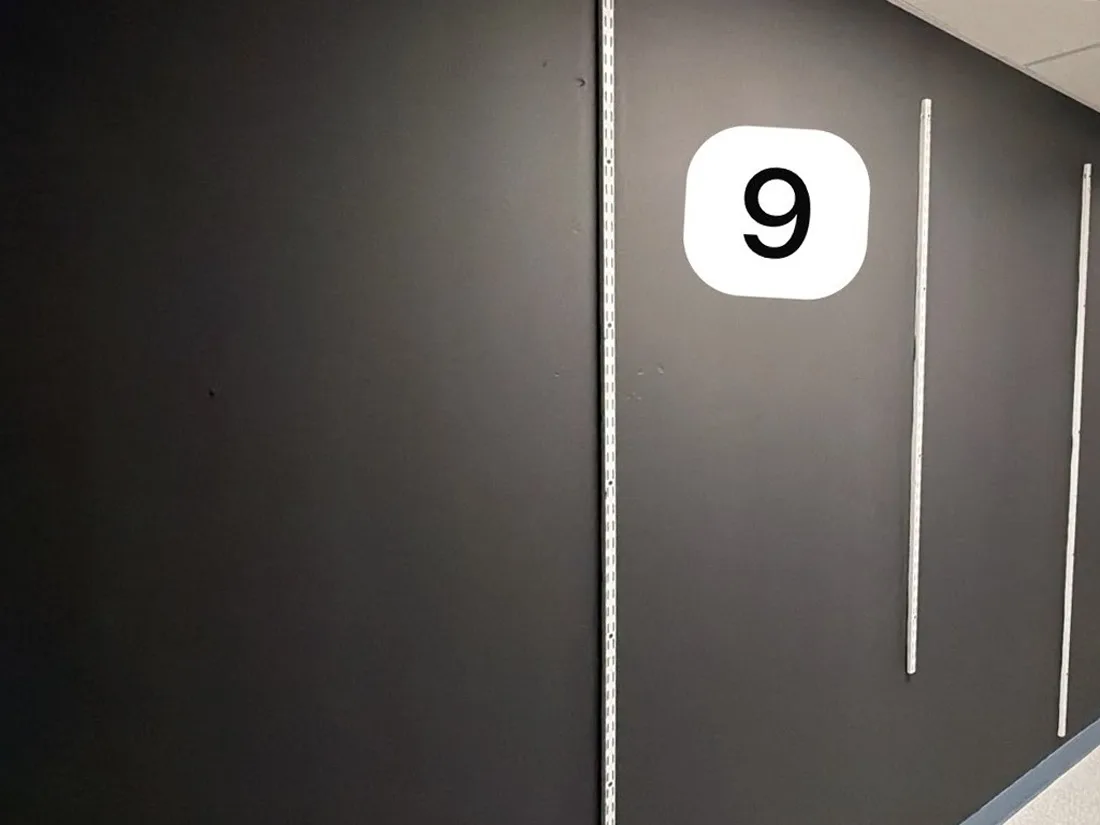 Stockroom wall 9 with wall standards after RFID shielding paint