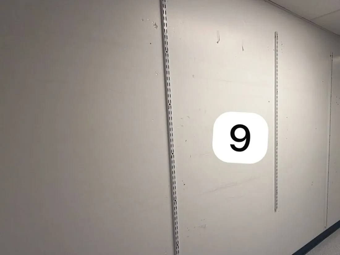 Stockroom wall 9 with wall standards before RFID shielding paint