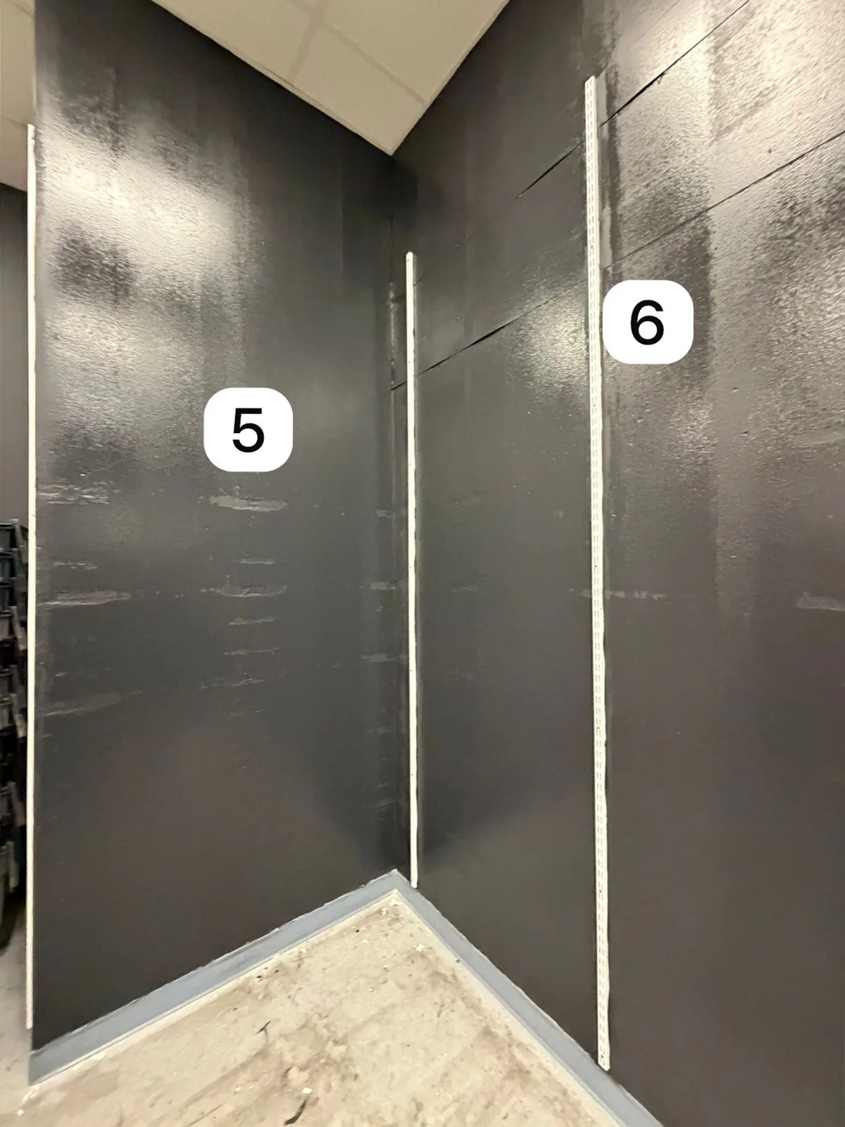 Corner where stockroom walls 5 and 6 meet, finished in shielding paint
