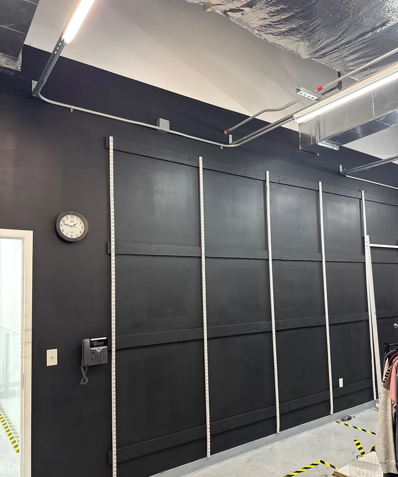 Finished black shielding wall with wall standards reinstalled